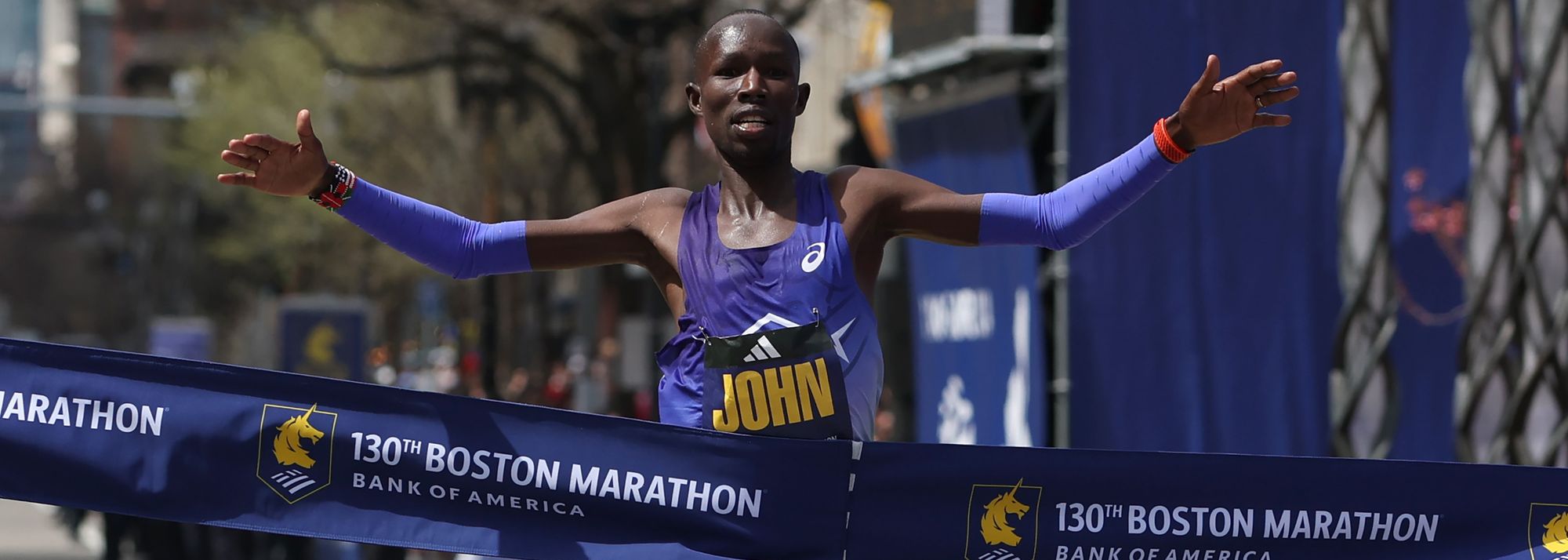 John Korir successfully defended his title at the Boston Marathon with a course record of 2:01:52 while fellow Kenyan Sharon Lokedi also retained her crown