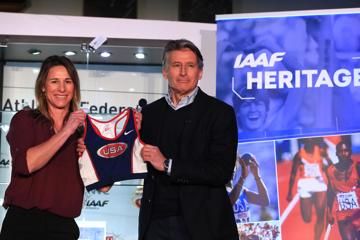 Stacy Dragila presents IAAF President Sebastian Coe with her kit from the 1997 World Indoor Championships