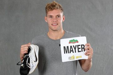 Kevin Mayer with his world record spikes and number
