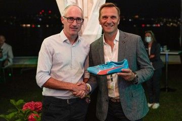 Weltklasse Zurich director Christoph Joho presents an autographed Usain Bolt spike to World Athletics CEO Jon Ridgeon