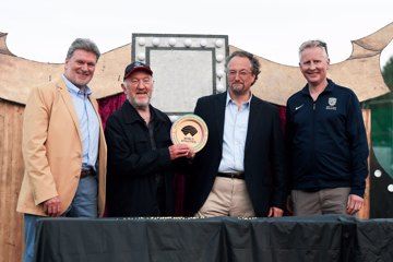 Eamonn Martin, Ian Byett, William Upton and Ian Beattie receive the English Cross Country Championships Heritage Plaque